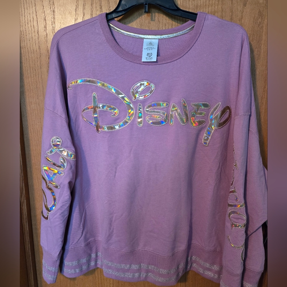 New Mauve pinkish colored Disney sweatshirt